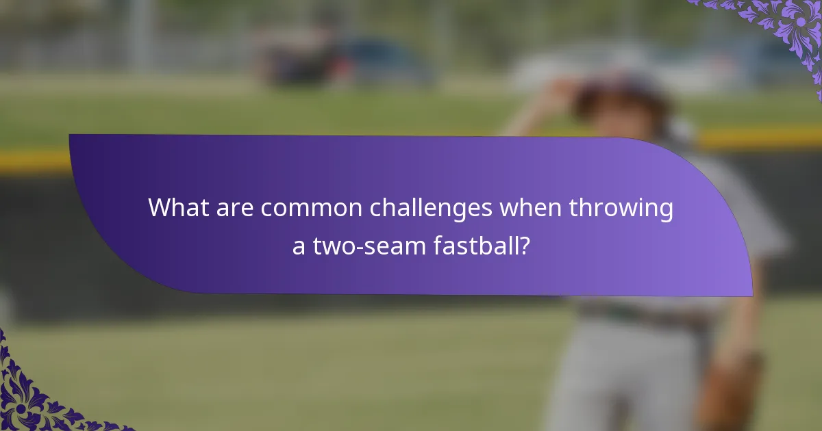 What are common challenges when throwing a two-seam fastball?